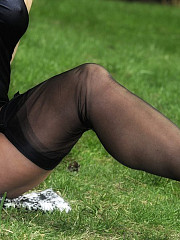 Amanda in black stockings spreads her image 9