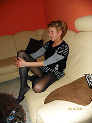 Mature ladies in pantyhose showing off image 3